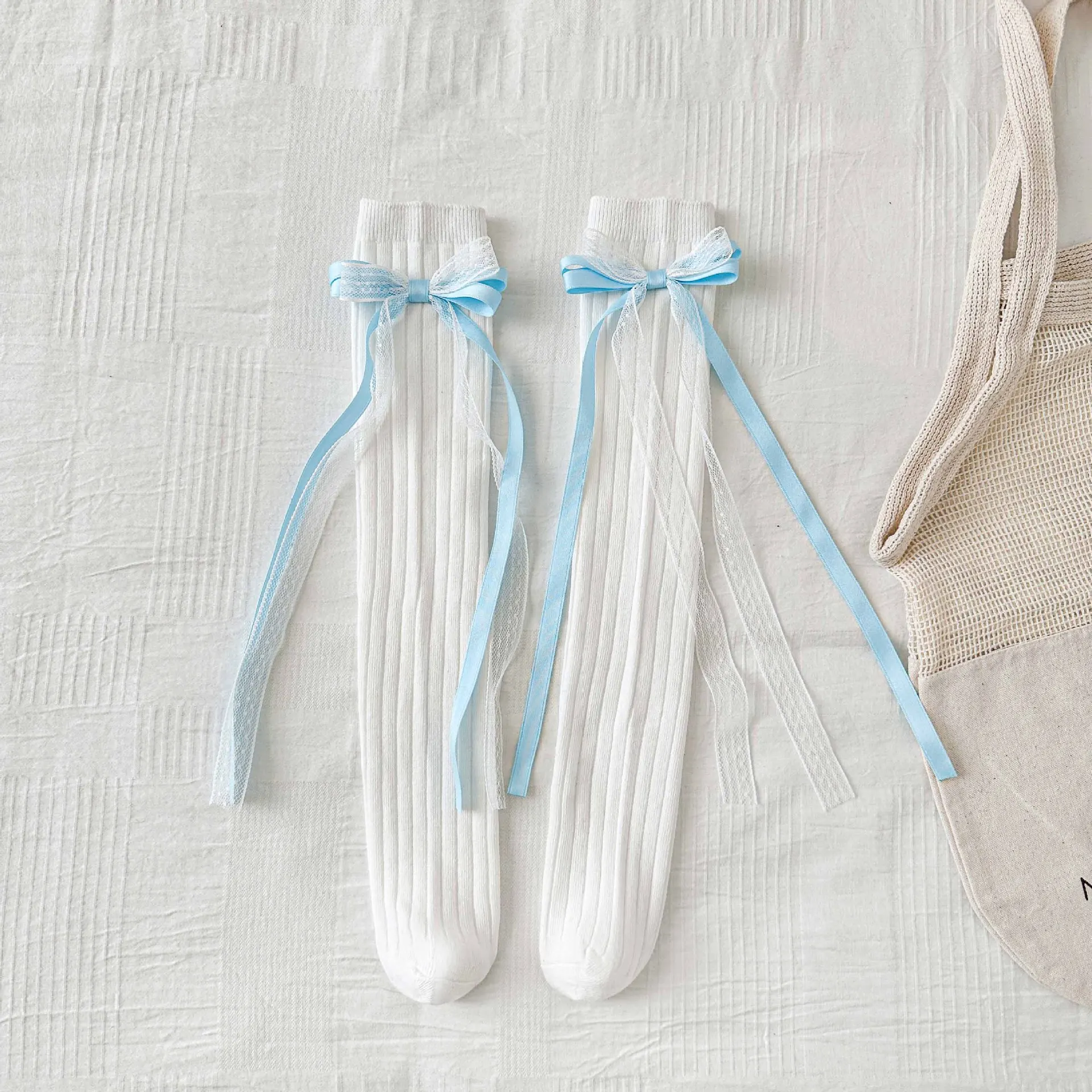 جوارب ربيع 2026 للأطفال البنات جوارب حلوة متوسطة الطول للفتيات جوارب طويلة بعقدة على شكل فيونكة على طراز القرآن جوارب للأطفال بشرابة #5