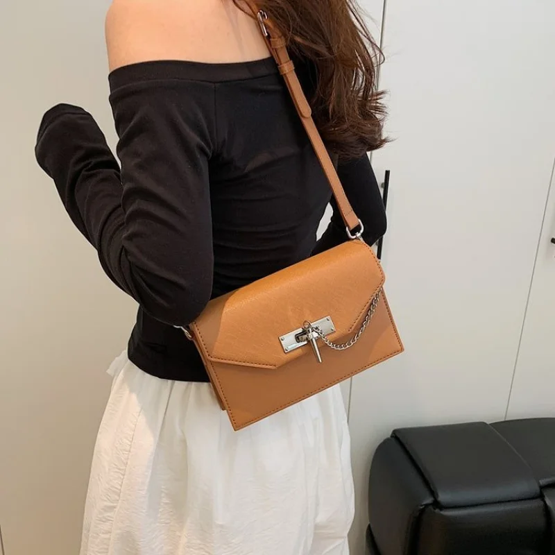 

Элегантная женская сумка-мессенджер из тонкой кожи, классический парижский стиль и аккуратный пригородный дизайн ​