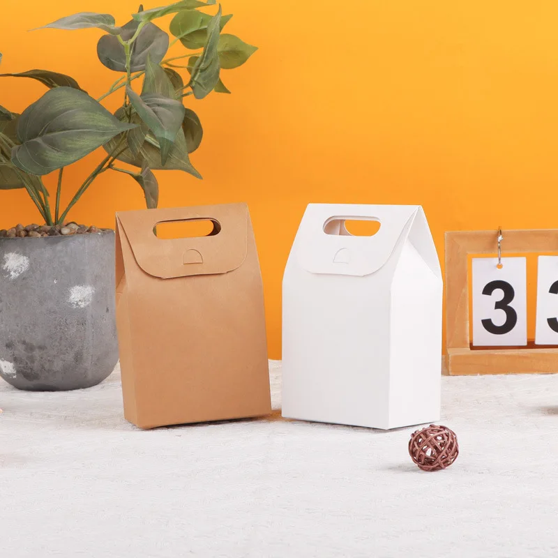 

100pcs 10*6*16cm Food Grade Handle Cheap Gift Shopping Kraft Paper Bag Printed Custom Paper Bags Household Products