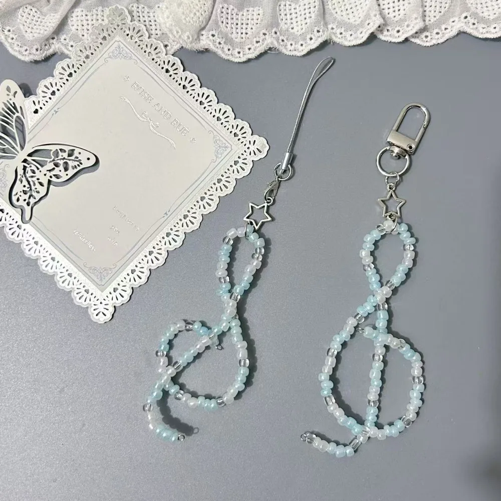 

Модный ремешок для мобильного телефона с музыкальной нотой, подвеска из бисера, ремешок для телефона, брелок для ключей, украшение для сумки, цепочка для телефона, подарок друзьям