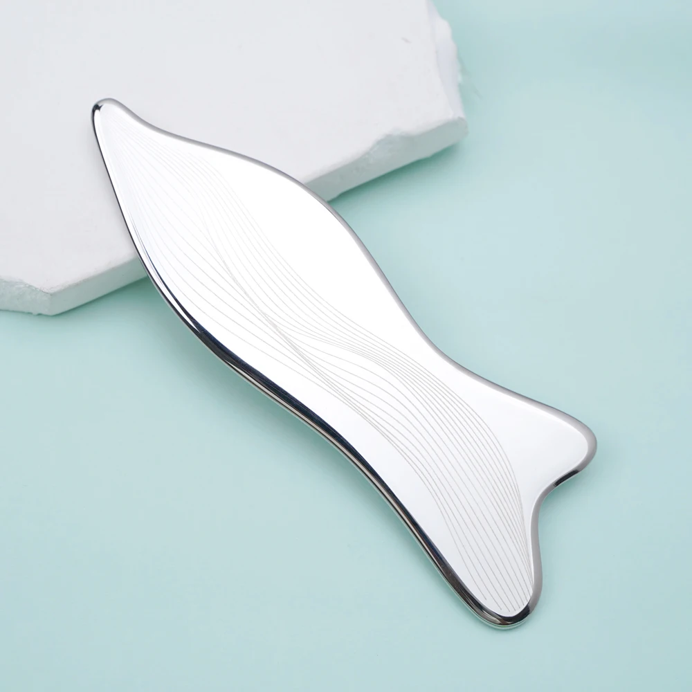 A Silver Orchid-Shaped Stainless Steel Scraping Board - A Body Massage Tool