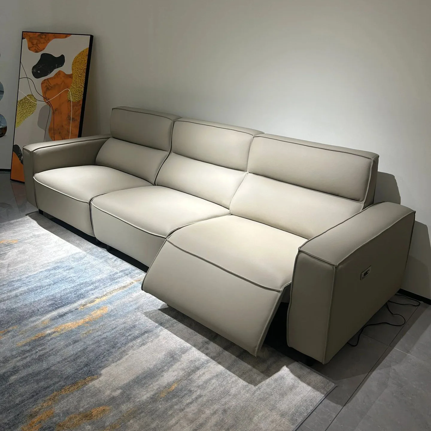 Electric multifunctional leather sofa Italian minimalist first-class space capsule straight row first-layer cowhide tofu sofa