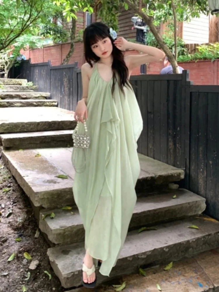 

Сексуальное летнее платье макси с открытой спиной и бретелями через шею, без рукавов, пляжное миди-платье, элегантный свободный наряд для отпуска для женщин, мода 2026