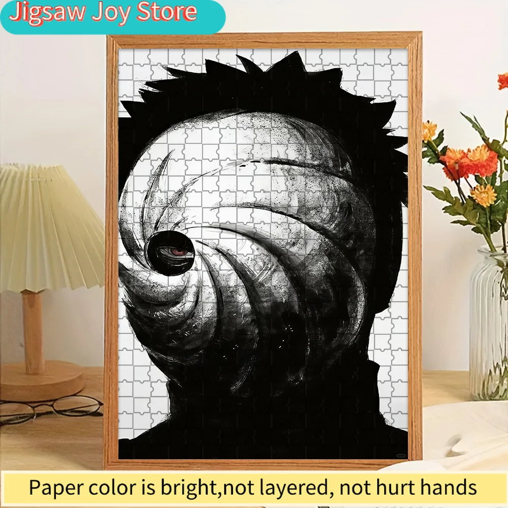 

High Quality Paper Jigsaw Puzzle Anime Uchiha Obito with Swirling Mask and Sharingan in Ink Art Style Vivid Color Printed Premiu
