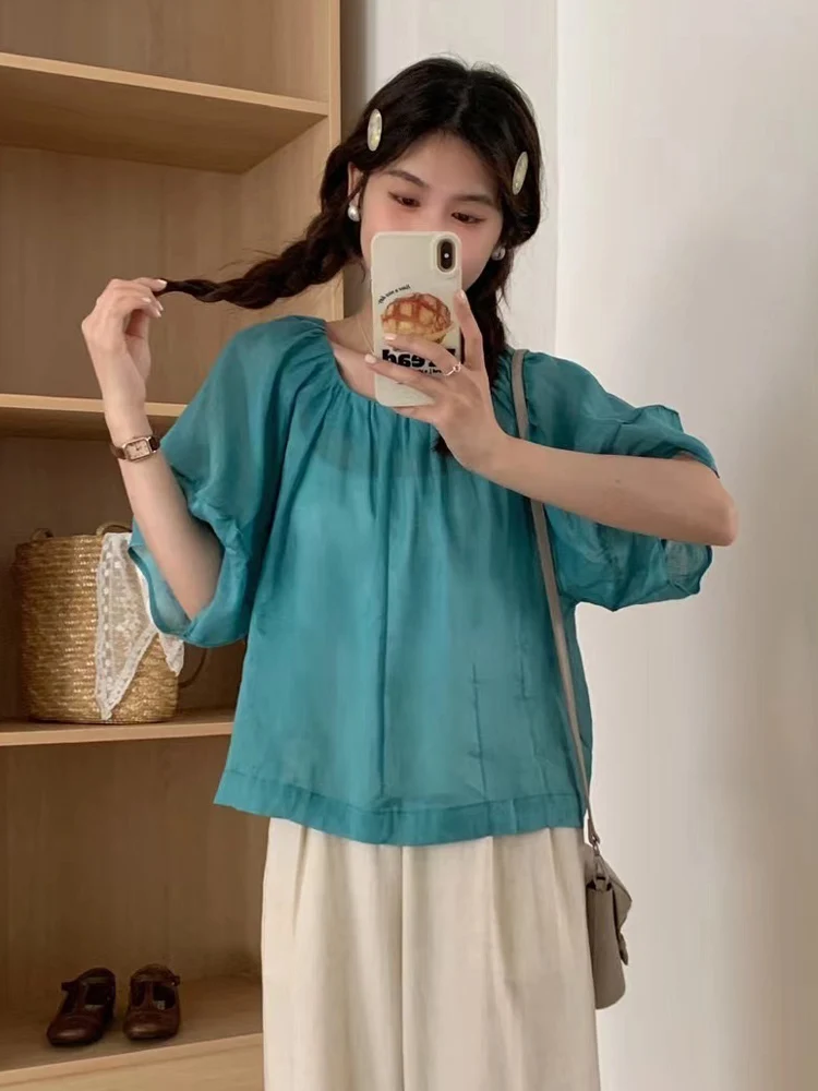 

Summer 2026 Women's Pure Color round Ne ort Sve irt 00% Flax Front Ba Wear Loose Fit Bubble Sve Cool Feeling