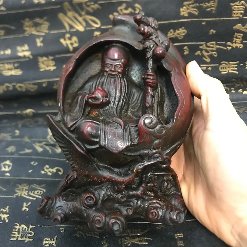 Antique-style resin crafts, including imitation peach ornaments, old peach figurines, and Buddha statues, designed to look aged