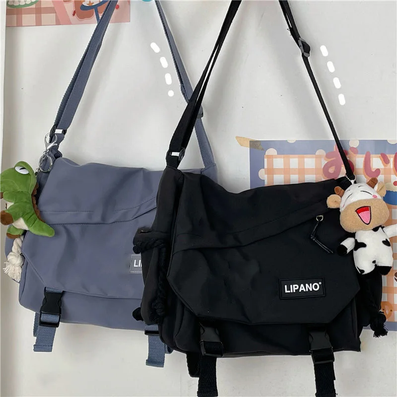 Borsa a tracolla da donna Borsa a tracolla da uomo di grande capacità Coreano giapponese Harajuku JK Borsa a tracolla per studenti in tela di moda