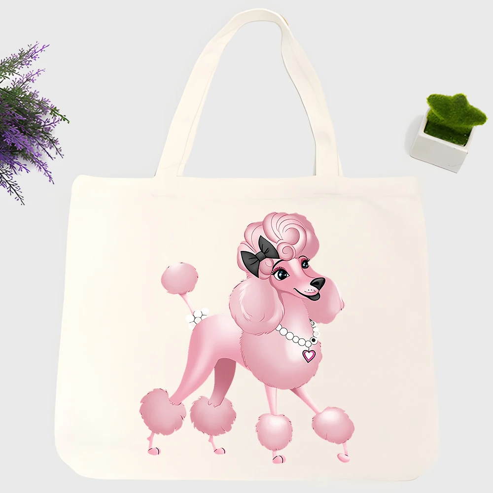 Women's canvas tote bag with pink poodle graphic, casual style for daily shopping and weekend outings
