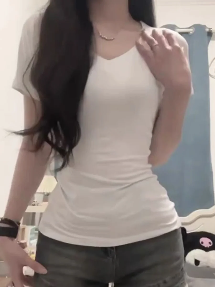 เสื้อยืดคอวีสีขาวสำหรับผู้หญิง รุ่นใหม่สำหรับฤดูร้อน ทรงเข้ารูป กระชับเอว สไตล์สาวฮอต เหมาะสำหรับใส่ไปทำงาน สไตล์เกาหลี คอวี...