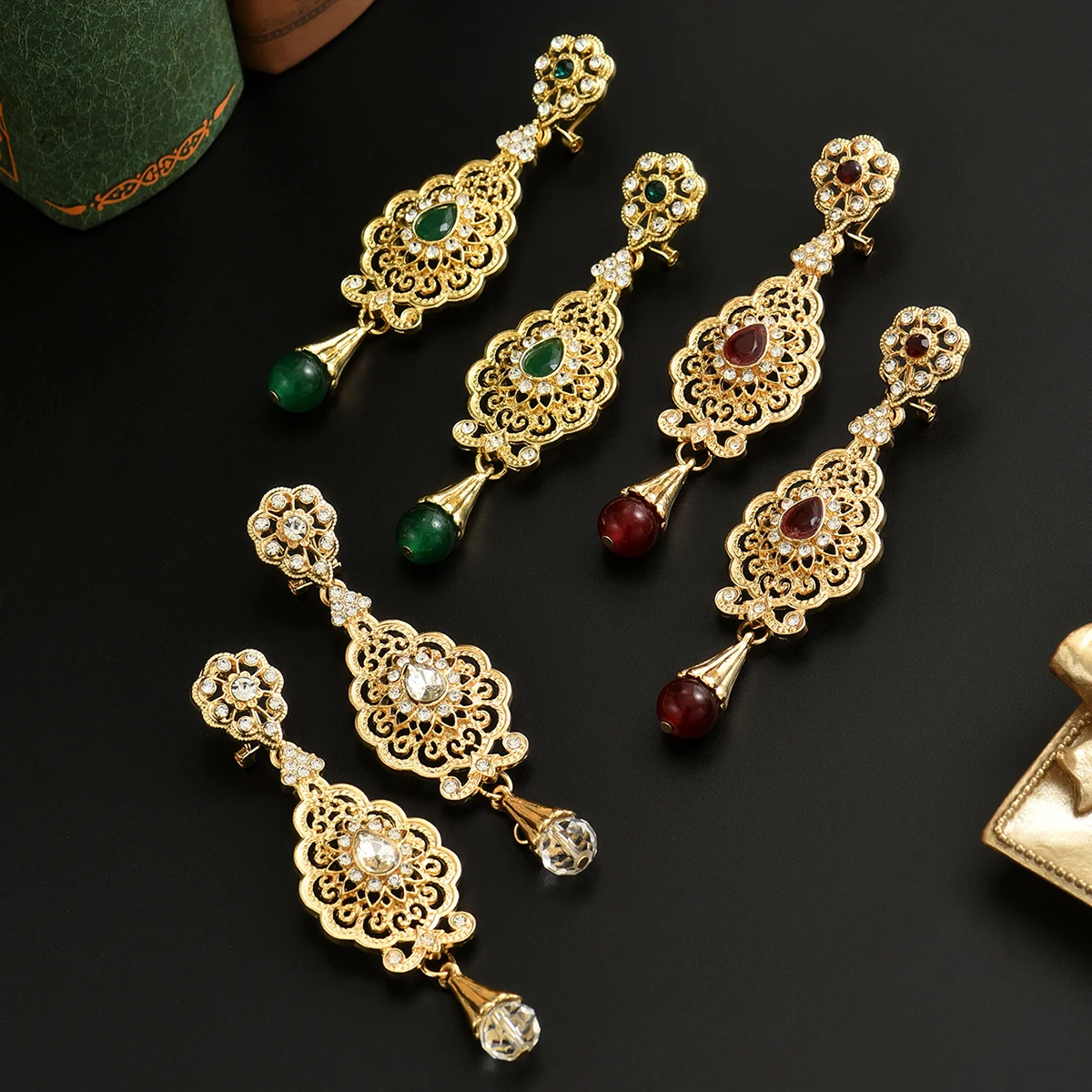 

A Pair Of Vintage Court-Style Water droplet shape Pendant Earrings With Intricate Hollow-Carved Patterns Designs On The Surface