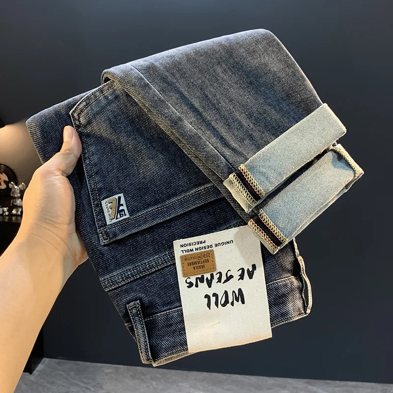 

2025 autumn tapered jeans men's style 2025 new trendy brand elastic high-end men's straight leg slim fit small leg pants