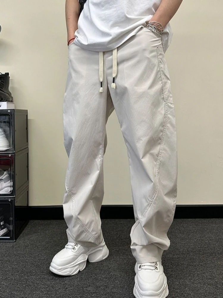 Calças casuais baggy homem solto novo na tendência estética roupas clássicas harajuku moda venda 2025 tamanho grande xxxl calças para homem