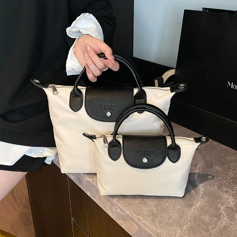 

Высококачественная повседневная женская сумка, универсальная пригородная сумка на одно плечо нового стиля 2025 года, нишевая нейлоновая сумка через плечо