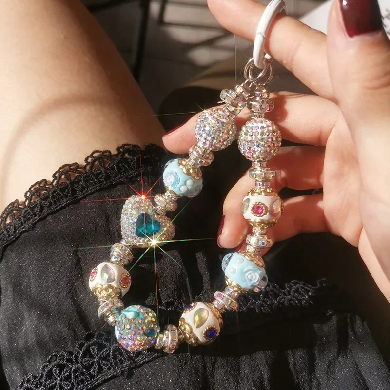 Mobile Phone Lashing Luxury Rhinestone Love Blue Tie Hand-beaded Hand Bead Chain Universal Shell Accessories Pendant Phone Charm