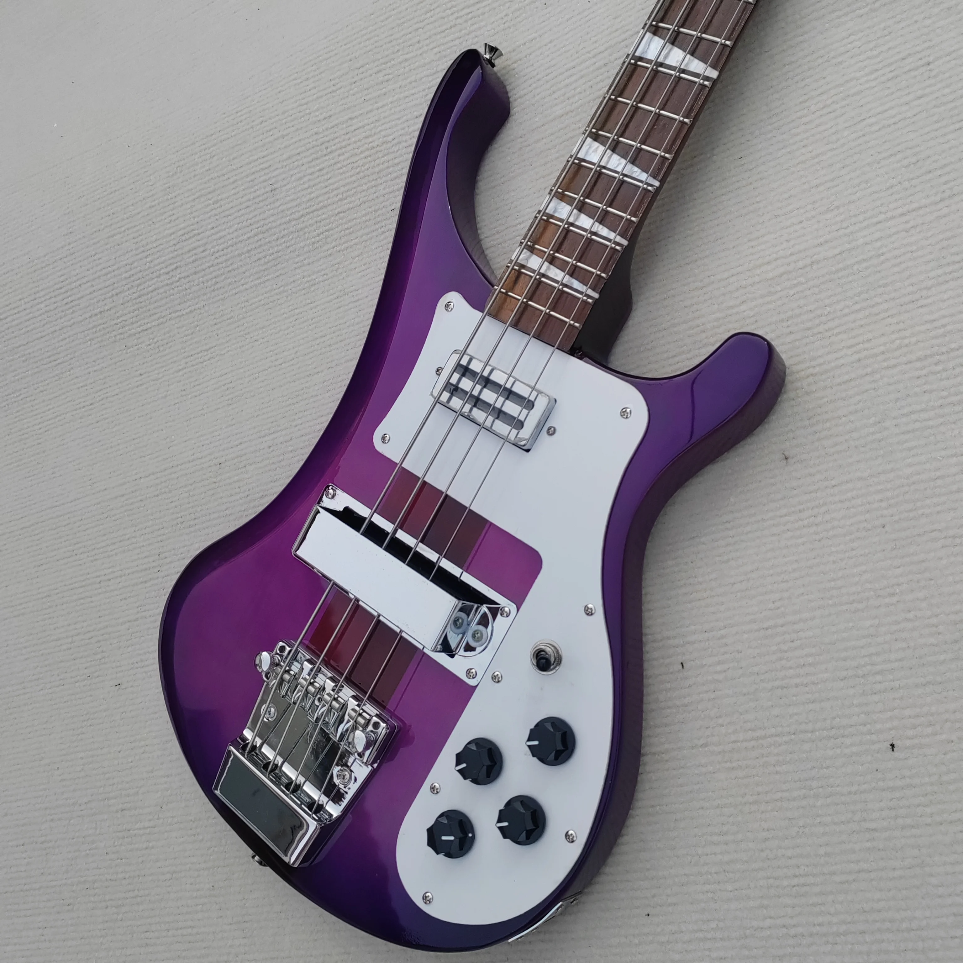 Customizable Color Purple Painted Alien 4-String Electric Guitar with White Pickguard Unique Styling And Standard Specifications