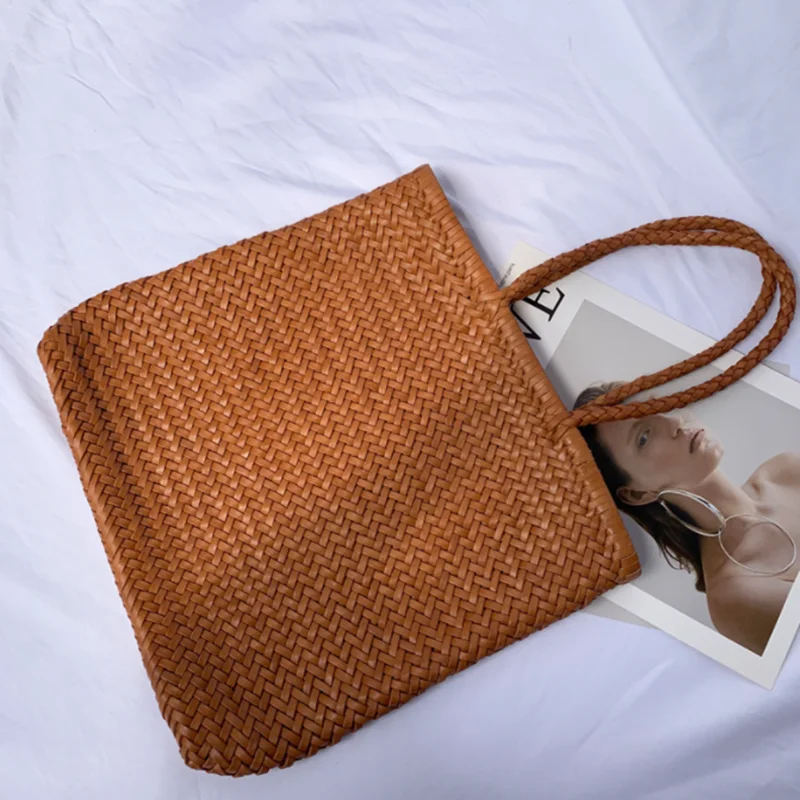 Japanese top layer cowhide hand woven shoulder bag  retro leather woven bucket bag Single shoulder vegetable basket bag female