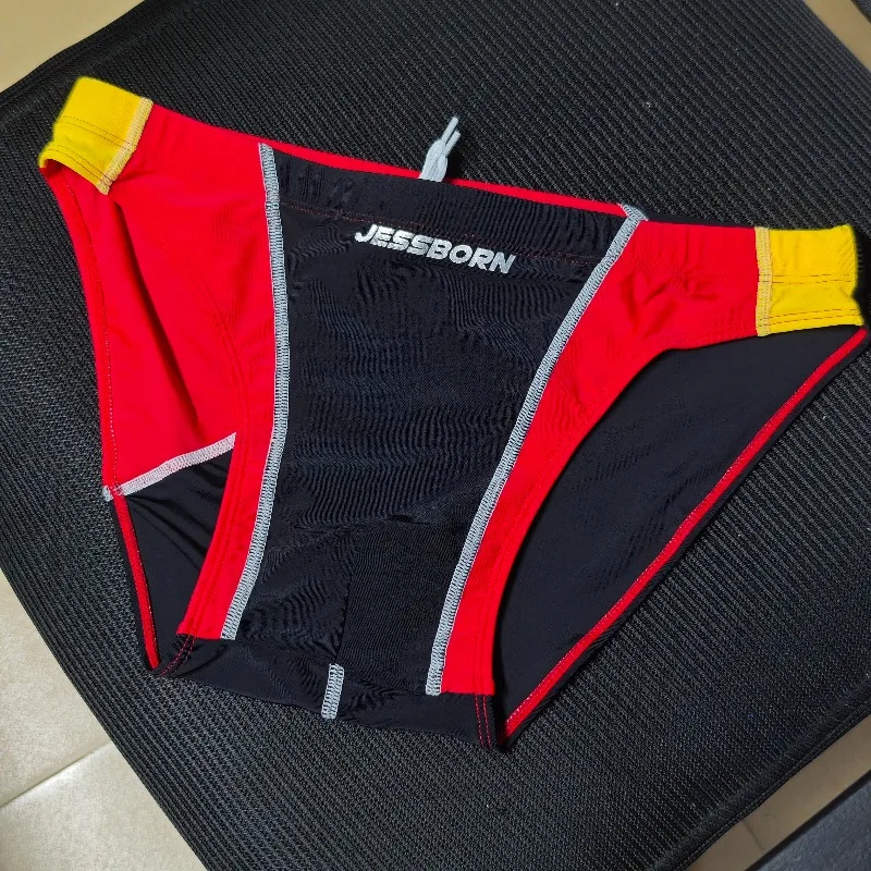 Japanese style triangle swimming trunks men's nylon color matching hot spring swimsuit European and American cup swimsuit 10118
