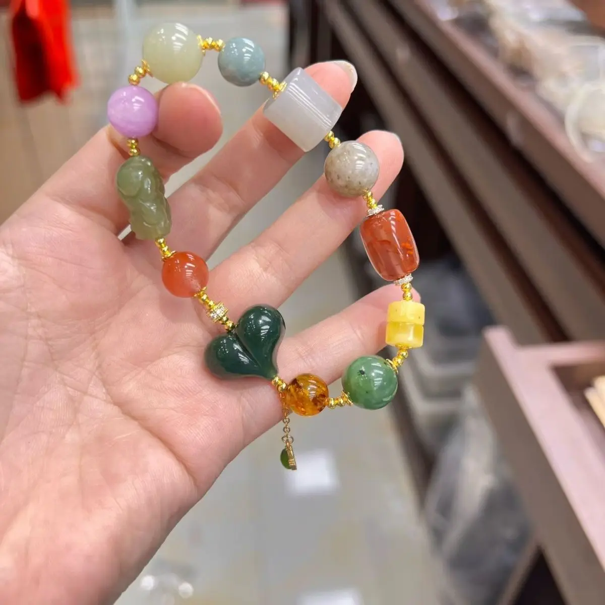 

Shangxin Hetian Jade Duobao Bracelet Nanhong Beeswax Jasper Huapo Purple Lithium Jade Design Bracelet