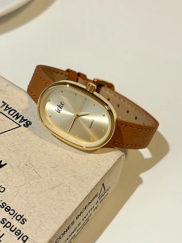 

New Oval Minimalist Style Luxury And Sophisticated Fashion Leather Strap Quartz Watch For Women - A Creative And Unique Gift.