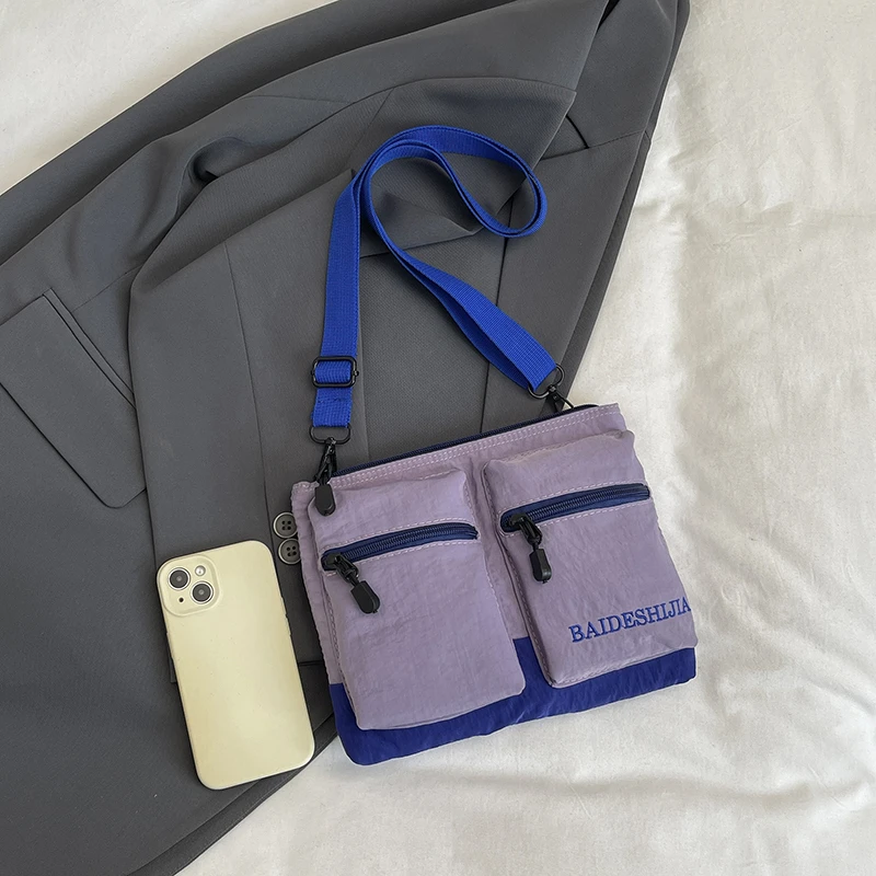 

Нейлоновая минималистичная холщовая сумка через плечо с двумя карманами, универсальная сумка-кроссбоди для мужчин и женщин, идеально подходит для путешествий и повседневного использования.
