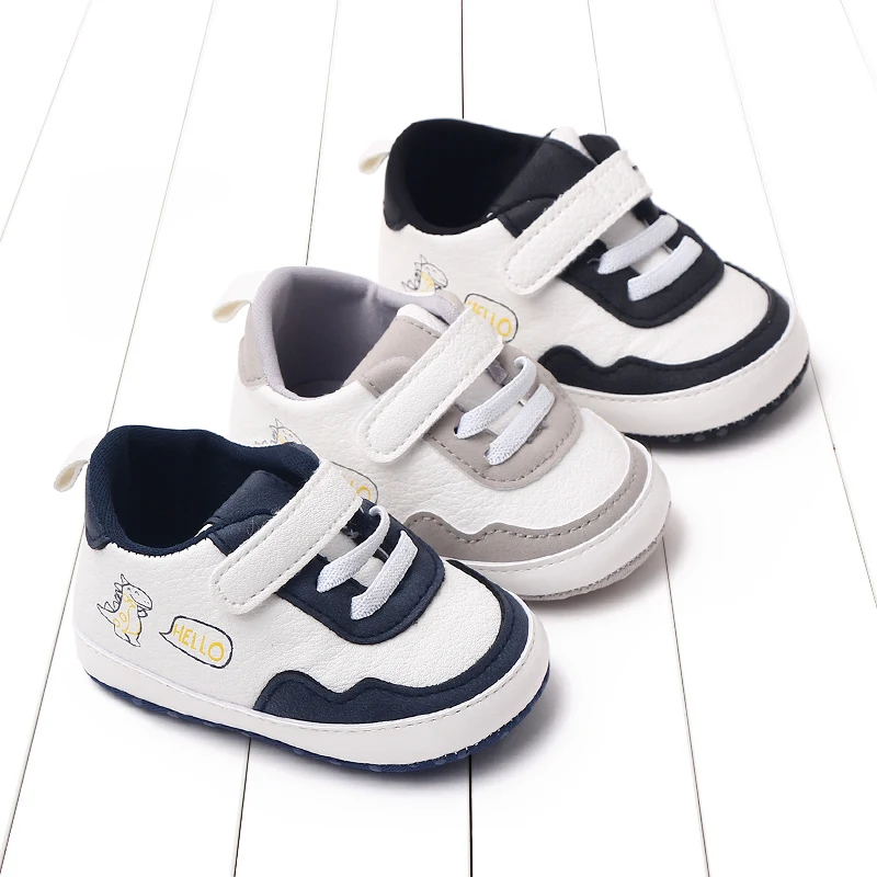 Scarpe per bambini di nuovo stile più vendute primaverili e autunnali per camminatori di apprendimento di dinosauri per bambini comodi con fondo morbido da 0-18 mesi