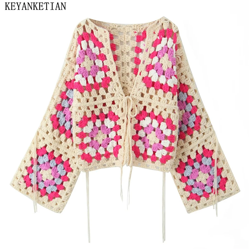 KEYANKETIAN BohemianHoliday wind Hollow out Knit Cardigans Bow Lace Up Tassel Decoration Women's Cropped Coarse Yarn Sweater Top