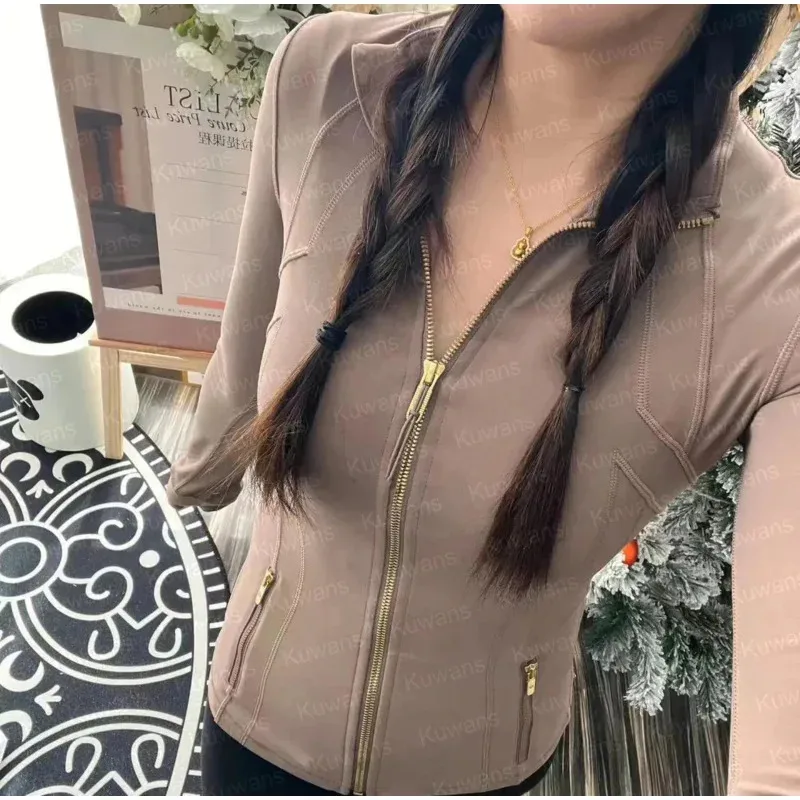 ملابس اليوغا النسائية الطويلة الأكمام سترة الزي بلون عارية الرياضة تشكيل الخصر اللياقة البدنية الركض ملابس رياضية لسيدة تحديد