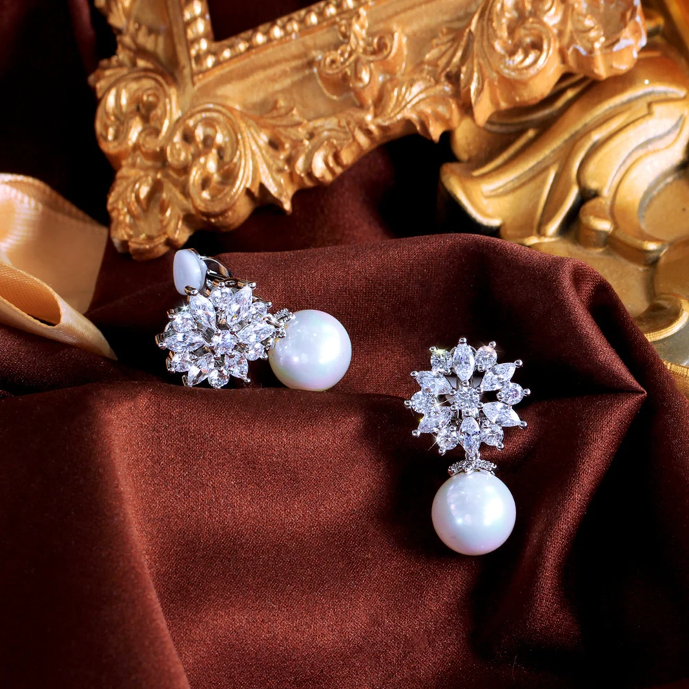 CWWZircons Elegant Cubic Zirconia Flower Pearl No Hole Earrings for Women Fashion Jewelry Ear Clip On Non Pierced Earring EJ0006