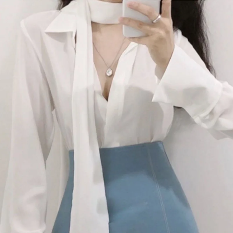 

summer 2022 New temperament celebrity style sexy feminine streamer slightly transparent commuter long-sleeved shirt top women