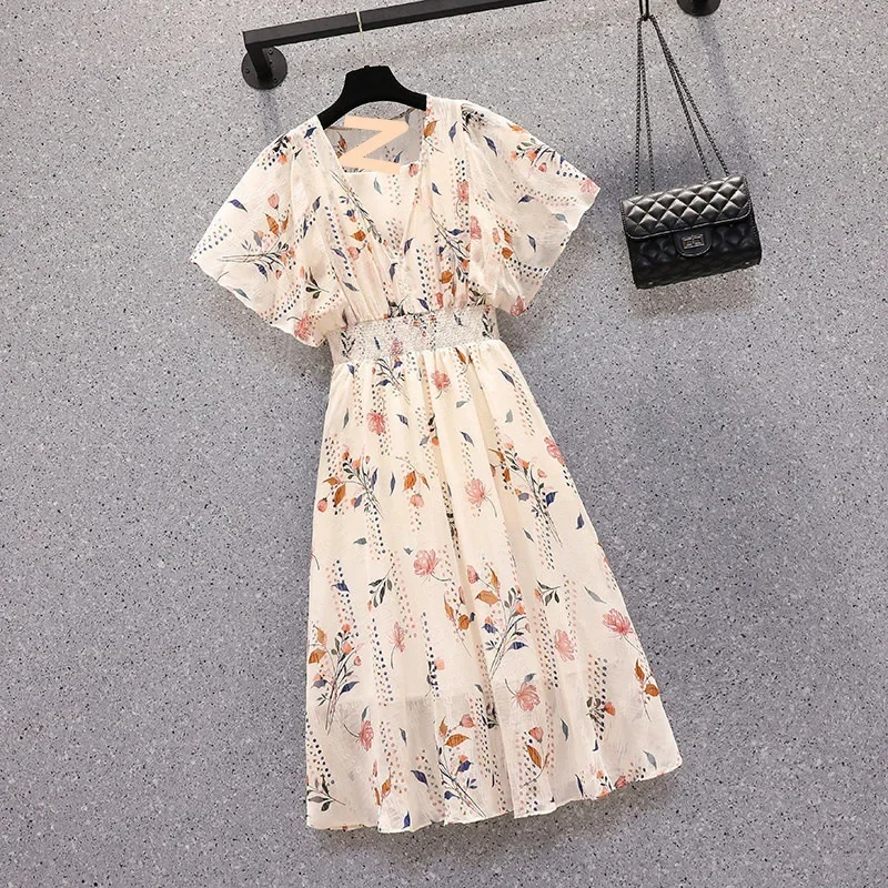 Temperament dress female summer new French plus size waist slim cover goddess chiffon skirt casual floral skirt long skirt.