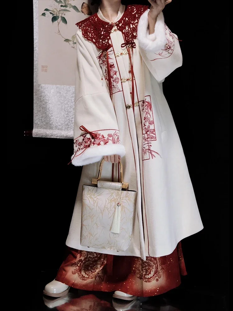 Hanfu suit autumn and winter women's hollow cloud shoulder embroidered long jacket Ming system