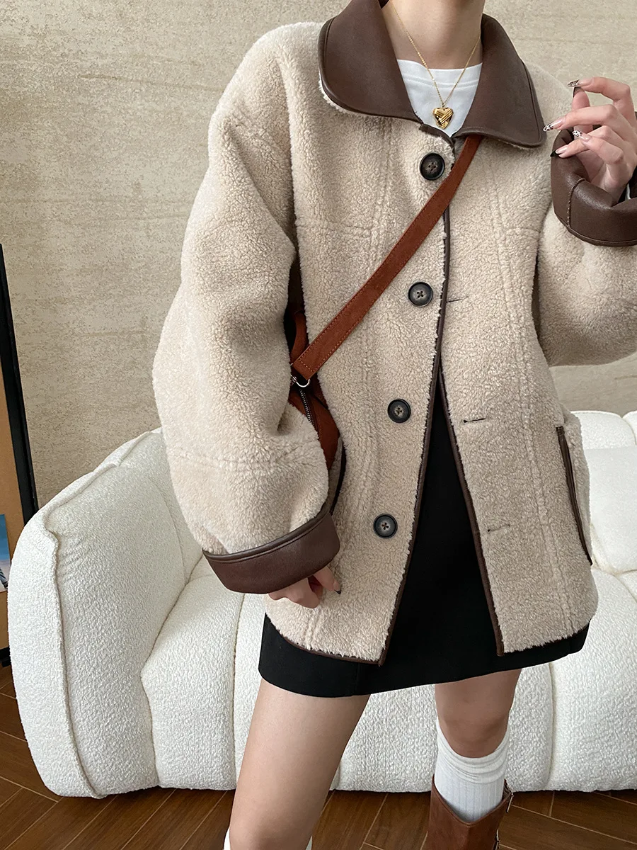 Winter women\'s casual solid color lapel long sleeved loose fur one-piece jacket