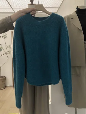 

New autumn and winter versatile fashion round neck solid color ribbed sweater