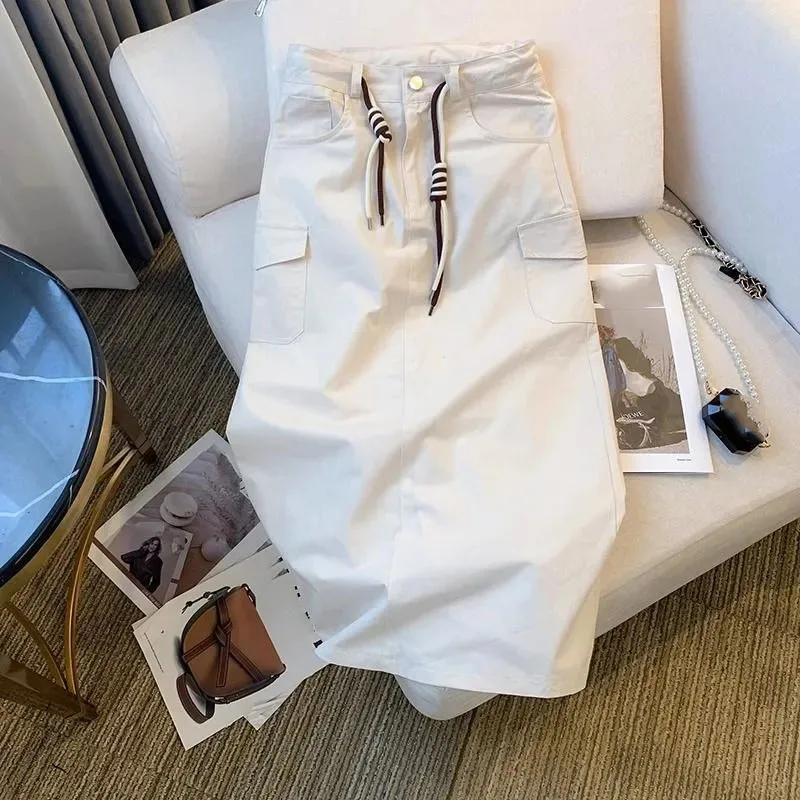 Damska spódnica maxi z wysokim stanem, kieszeniami i rozcięciem, nowość 2026, wiosna-lato, średniej długości, jednolita, duży rozmiar 4XL.