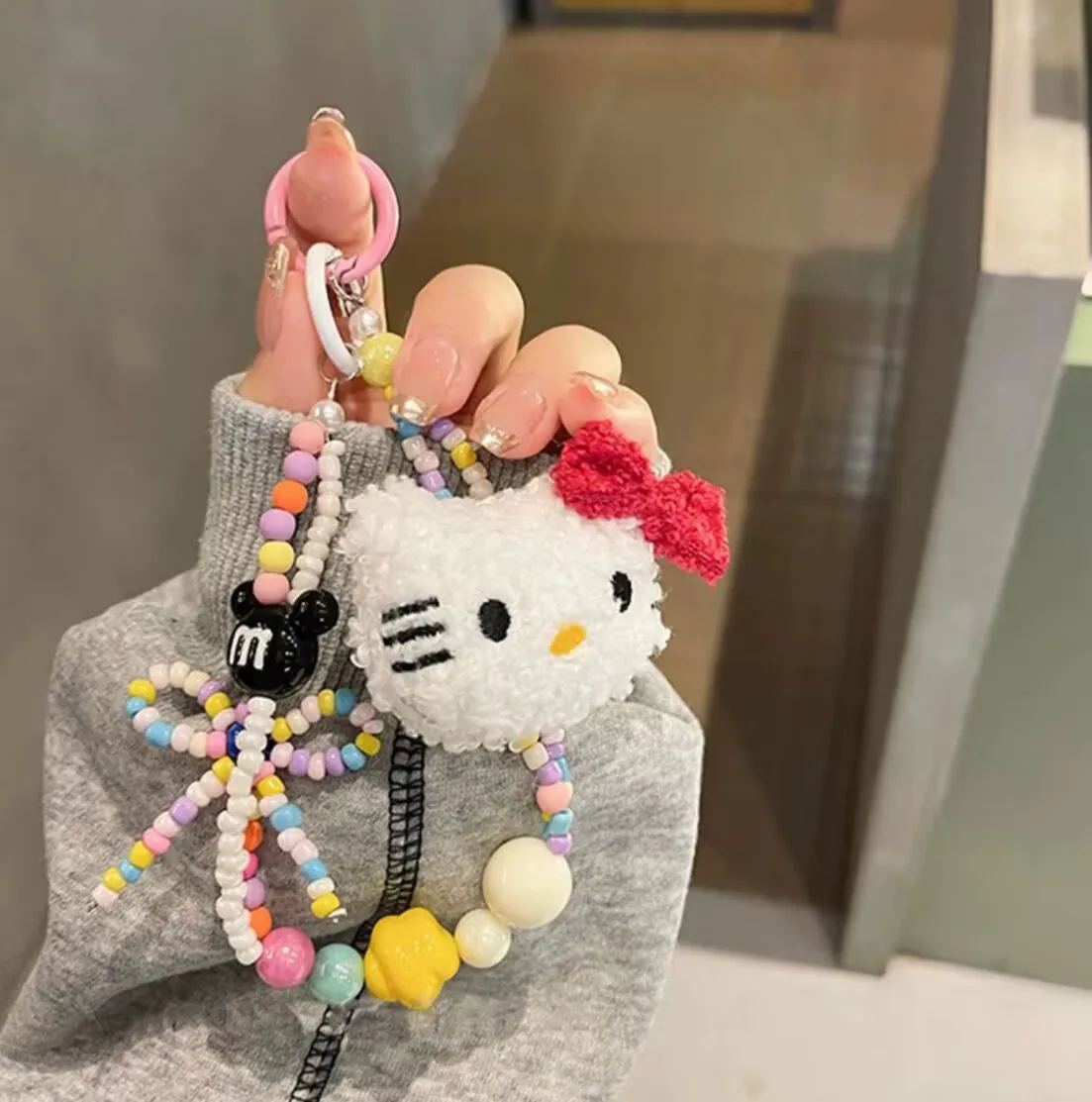 

Girl bow KT cat colored bead string mobile phone chain earphone bag hanging mobile phone case back clip wrist rope