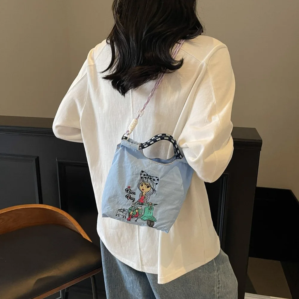 Women's Nylon Shoulder Bag Cartoon embroidery Large Capacity Drawstring Mobile Phone Bag Lightweight Messenger Bags Bucket Bags