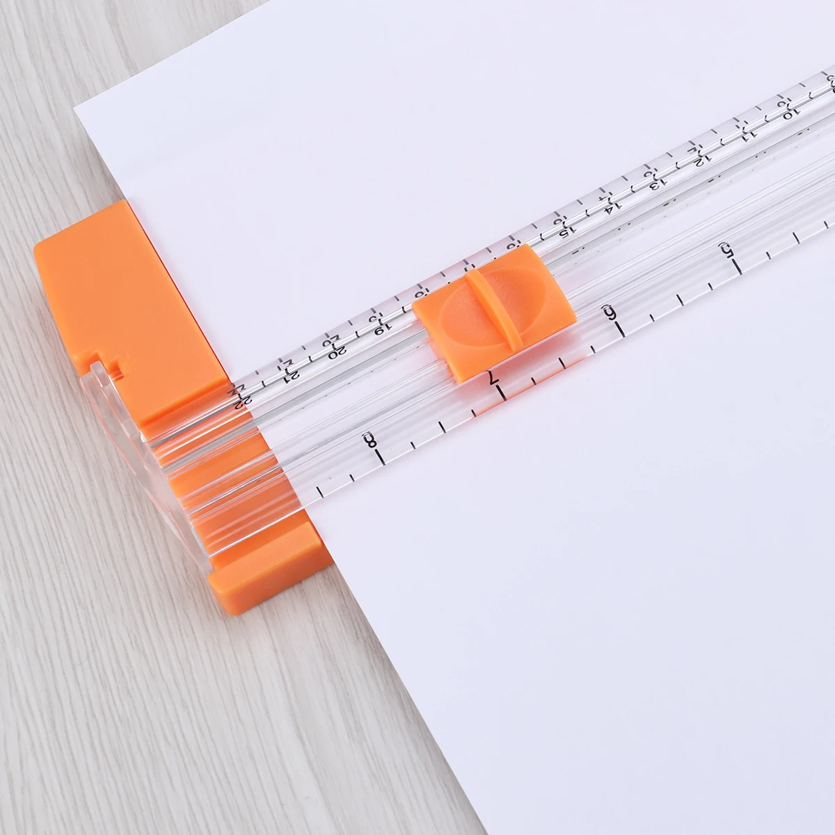 

1Pcs Portable A5 Paper Trimmer Mini Cutter with Safety Guard and Measurement Grid for Precise Cutting