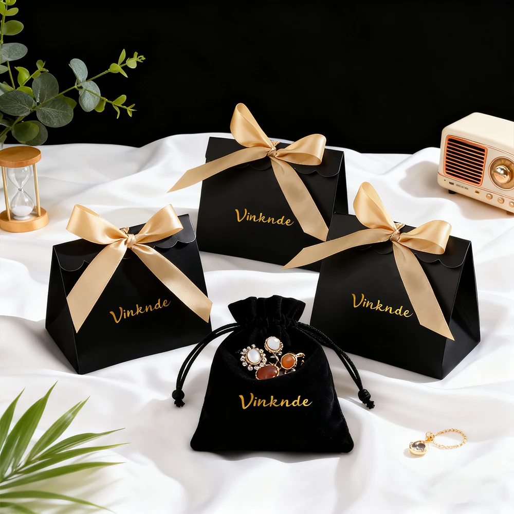 

Индивидуальный логотип, изысканная лента, маленькая подарочная коробка, жесткое кольцо из картона коровы, ожерелье, серьги, косметические конфеты, другие маленькие сумки, чехол