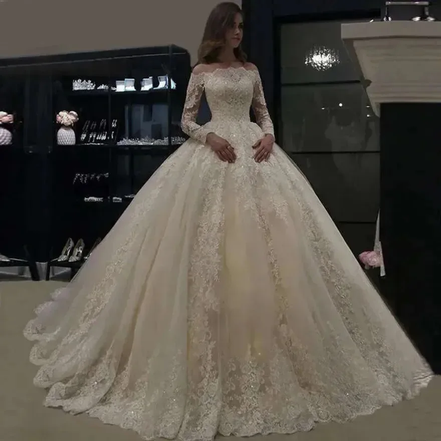 Luxury Ball Gown Lace Applique Wedding Dresses 2026 Long Sleeves Bridal Gowns Boat Neck Beaded Women Robe De Mariee Plus Size