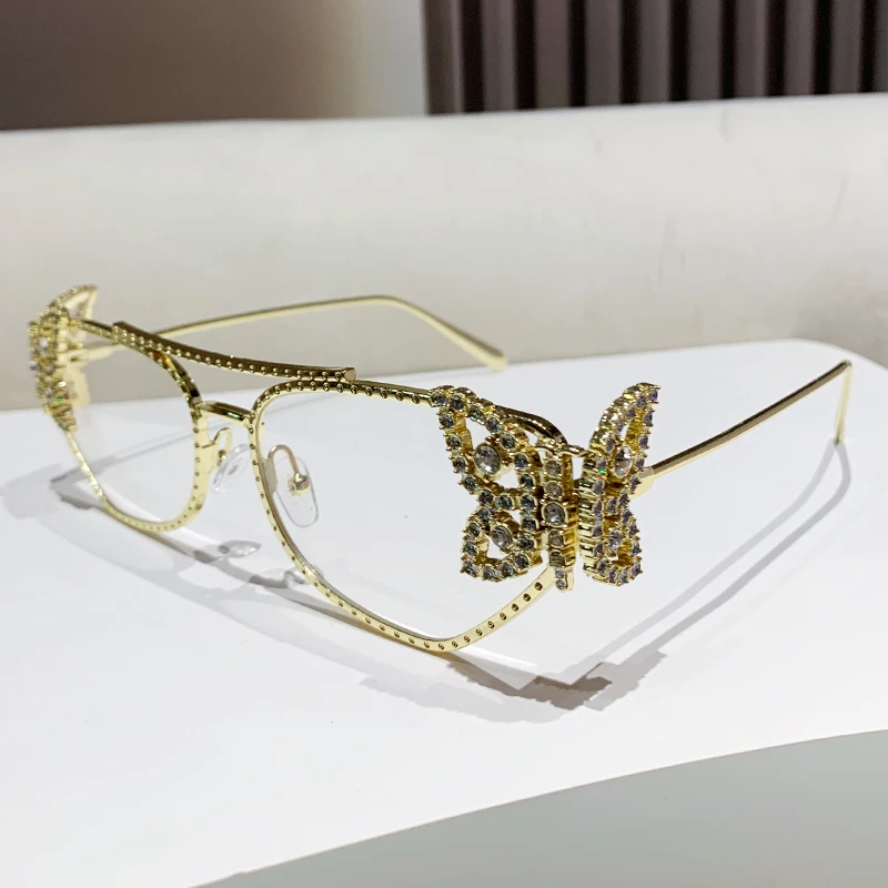 New fashion butterfly decorated women's glasses diamond-encrusted metal sunglasses for parties and festivals