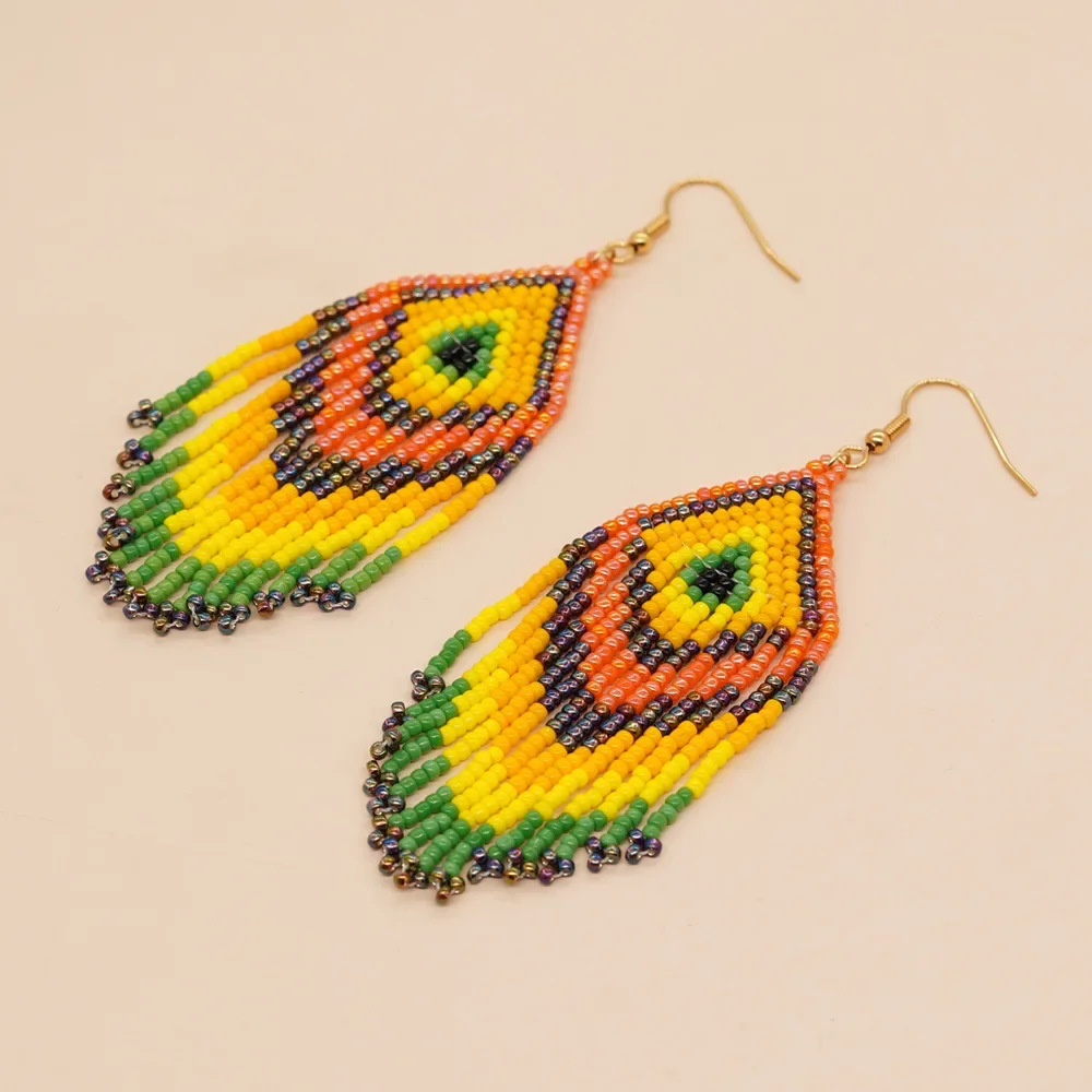 

Rice bead earrings Tassel Flower Versatile Rainbow Eyes Simplicity Hand weaving Alloy Gradient color Bohemia Beaded earrings