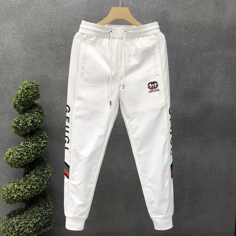 

Модные брендовые мужские летние новые тонкие повседневные брюки, модные модные узкие спортивные брюки с маленькой ножкой, универсальные брюки