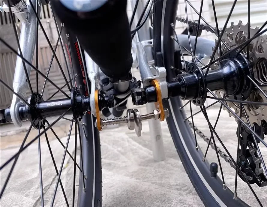 Per Dahon ruote per telaio bici pieghevoli supporto di fissaggio pieghevole telaio magnetico piega staffa fissa accessori per biciclette pieghevoli