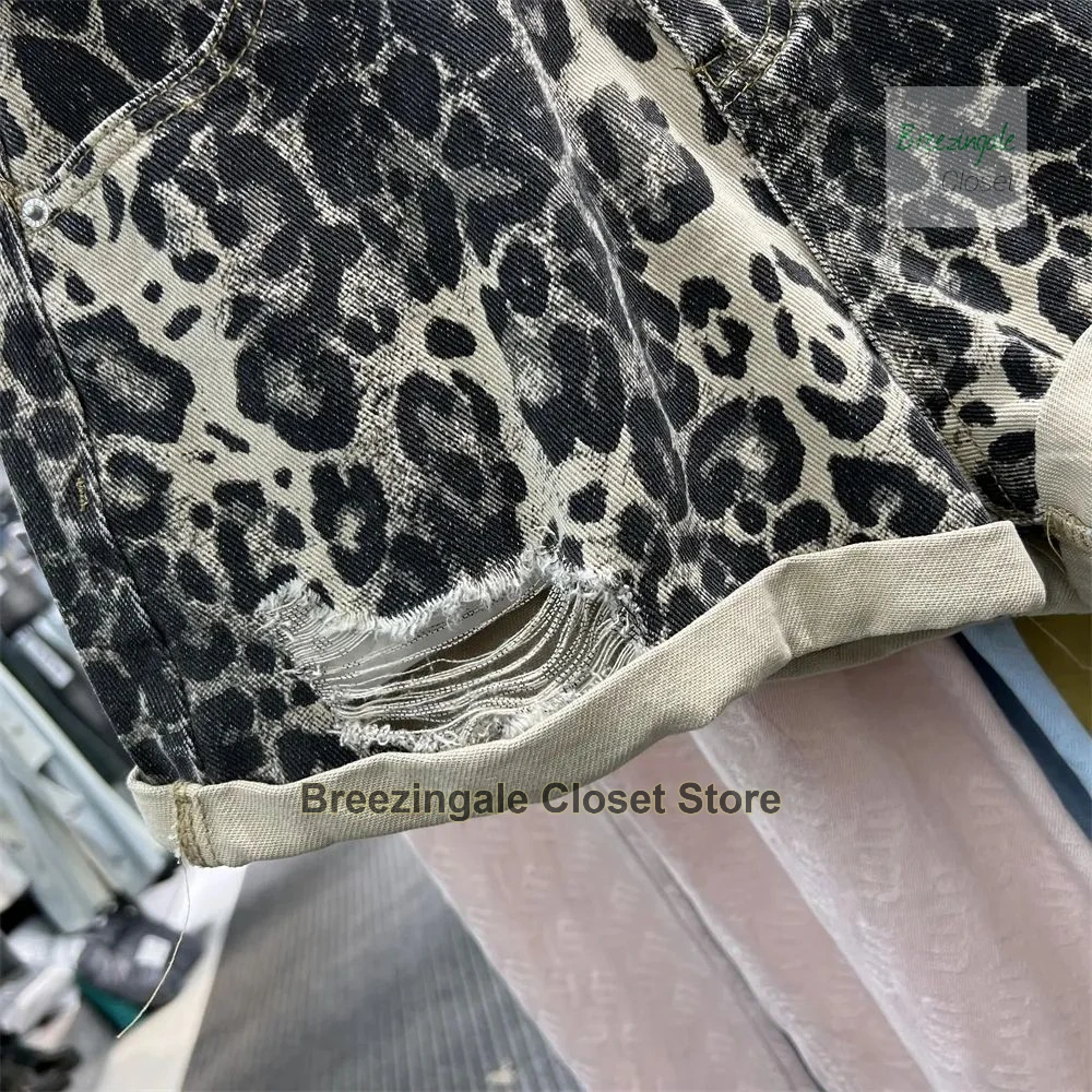 Korean-style high-waist beaded leopard print denim shorts for women's summer new loose niche fashion design temperament shorts.