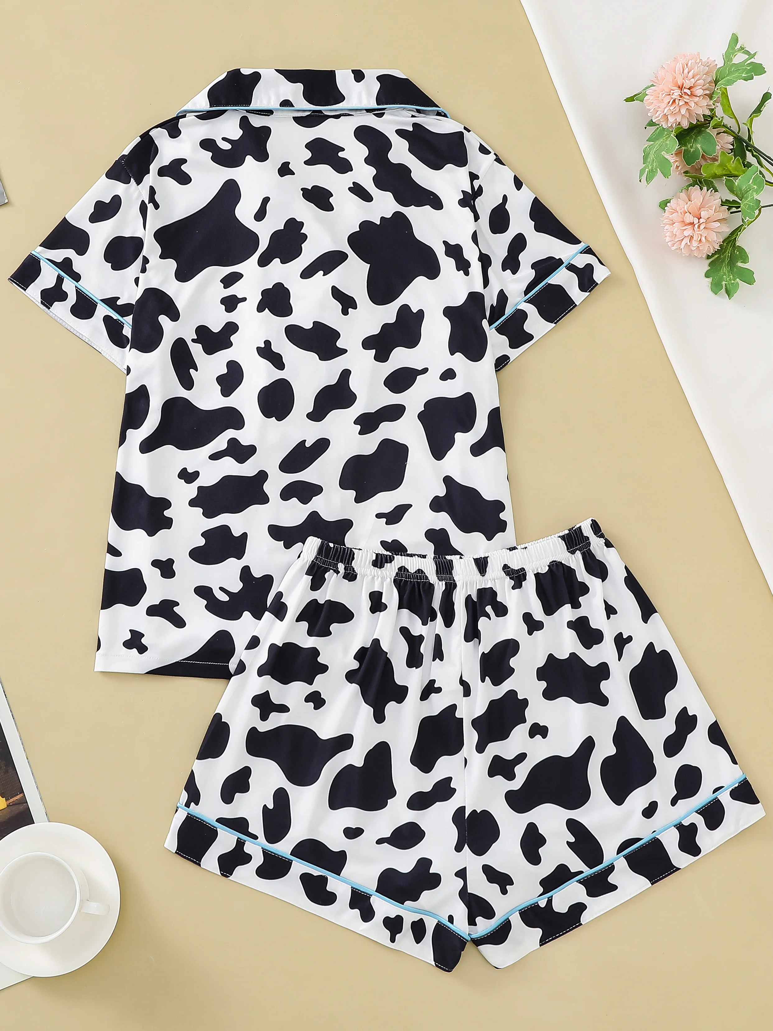 White background cow print women\'s sleepwear set cardigan short sleeved top and loose shorts comfortable women\'s sleepwear