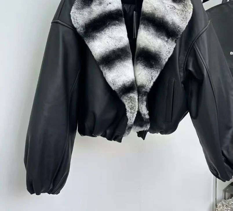 Winter nieuwe modieuze schapenvacht ganzendons knoopsluiting met drakenkat kleur geïmporteerde otter konijnenbontjas dameskleding