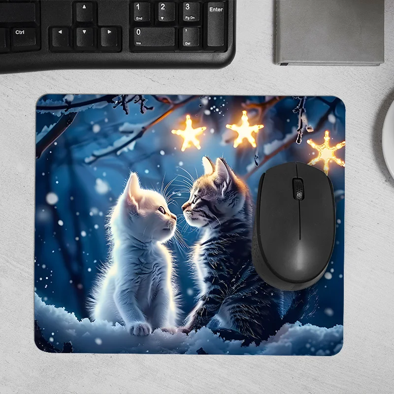 The whimsical cat couple design mouse pad with an anti-slip rubber base is durable and suitable for gamers and home offices