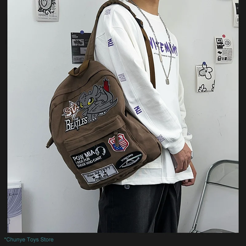 

American retro backpack, toothless little monster student schoolbag, drape, trendy hip-hop backpack gift