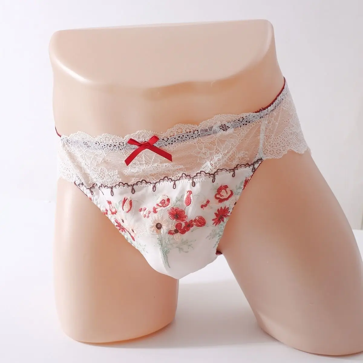 Męska haftowana seksowna bielizna koronkowa prześwitująca siateczkowa slipy z miękką wypukłą kieszonką erotyczne majtki dla crossdresserów prezent dla chłopaka Harajuku