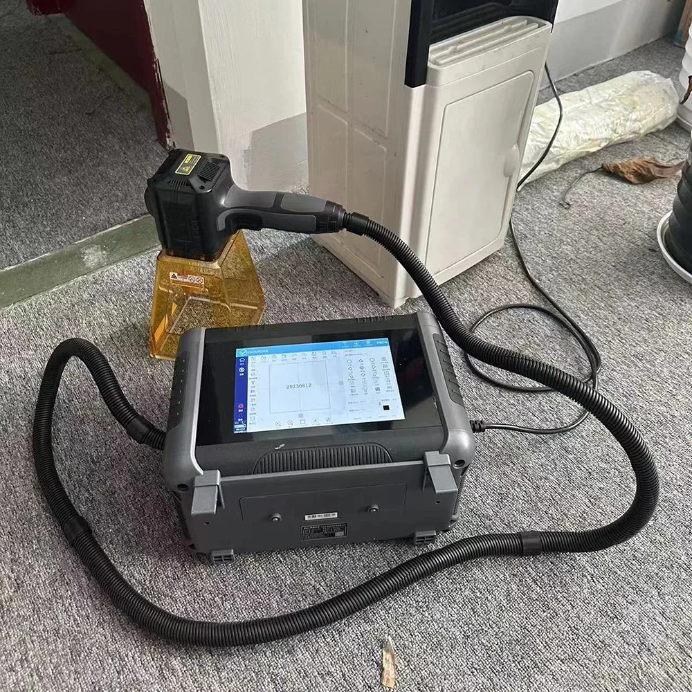 

Small 20w 30w Handheld CO2 Fiber Metal Plastic Carton Engraving Machine Portable